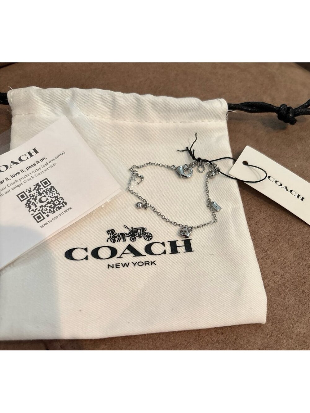 Coach Silver Tone Charm Bracelet with Heart and Logo Charms